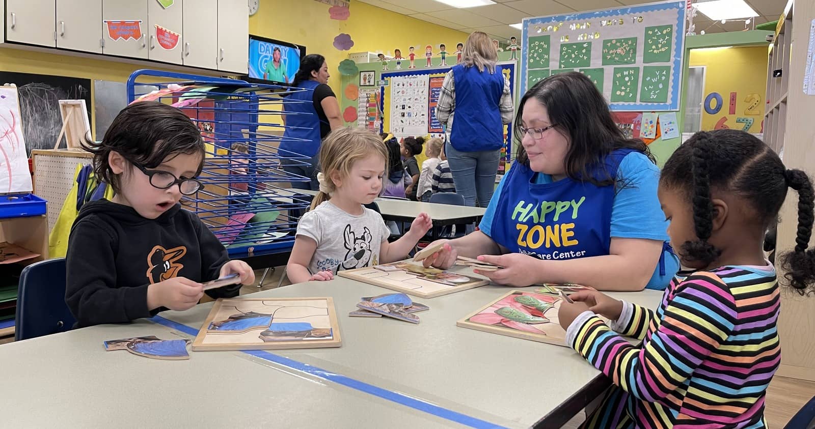 Children learning together at Happy Zone