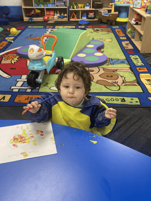 Toddlers playing with building blocks